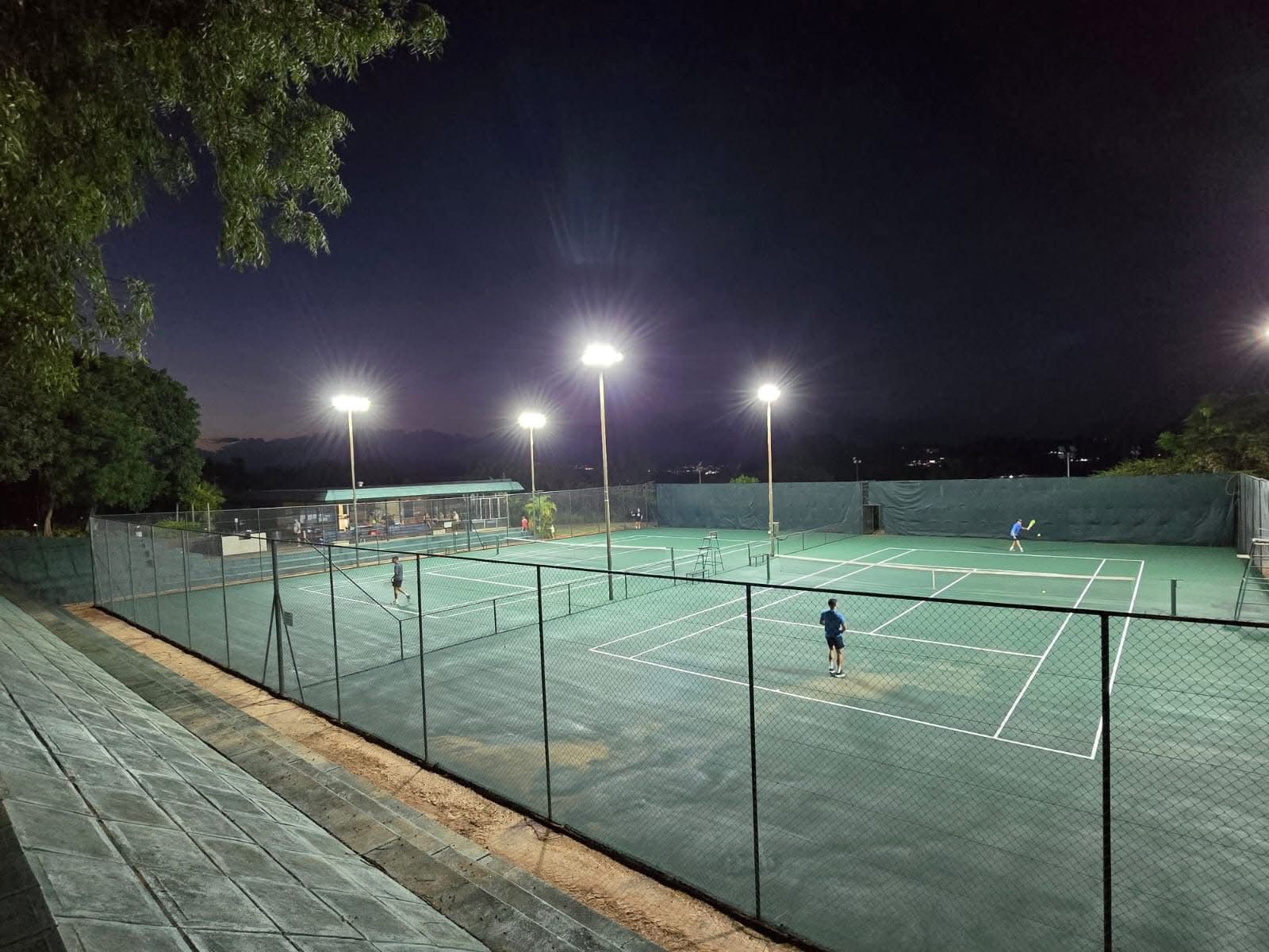 Members playing tennis